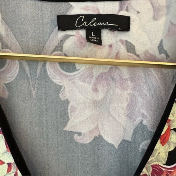 Calessa‎ women’s size Large v-neck with handkerchief style bottom dress - Picture 7 of 10